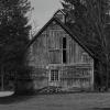 A black & white perspective 
of this rustic old barn.