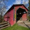 A close up view of the 
Pont Ste-Andre Covered Bridge.