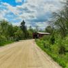 Approach to the 
1932 Cousineau Covered Bridge.
Near Gracefield, QC.